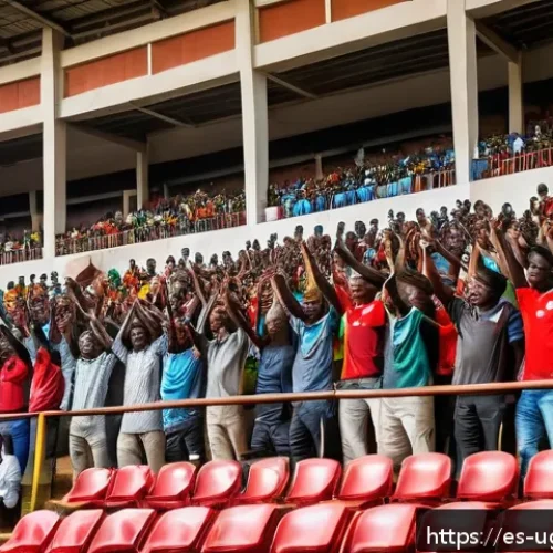 우간다 축구 리그 - A vibrant scene inside a renovated Ugandan football stadium filled with diverse families and groups ...